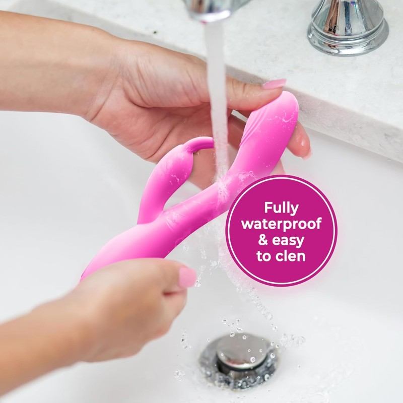 Dual-ended heated vibrating wand in soft pinkعصا اهتزازية حرارية مزدوجة الطرف باللون الوردي الناعم