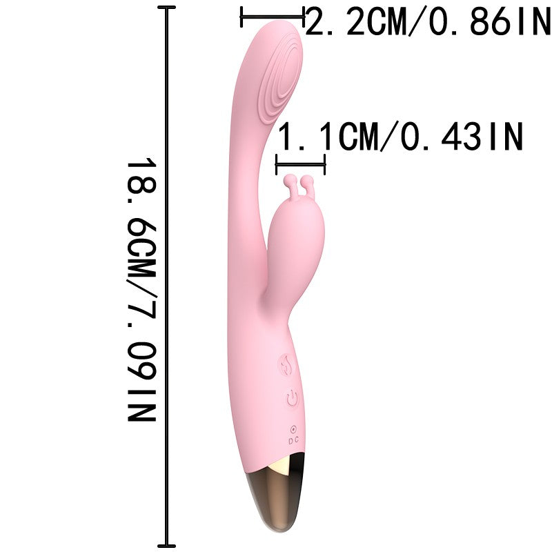Dual-ended heated vibrating wand in soft pinkعصا اهتزازية حرارية مزدوجة الطرف باللون الوردي الناعم